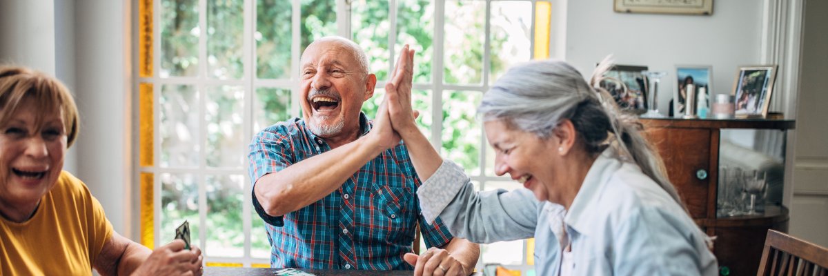 Senior people playing cards in nursing home Senior people playing cards in nursing home